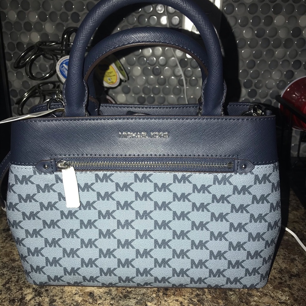 blue MK bag w handles crossbody shoulder strap.